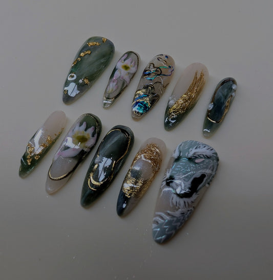 imperial dragon design in jade variant. marbled green and white veins, hand painted dragon elements, 3d lotus flowers, and gold chrome paired with pearls complete this timeless look