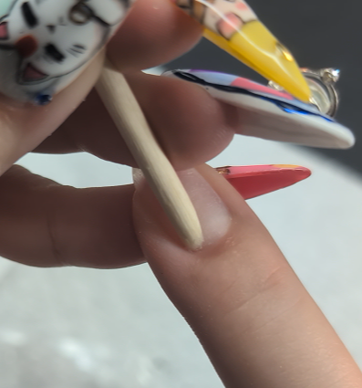 showing how to push back your cuticles