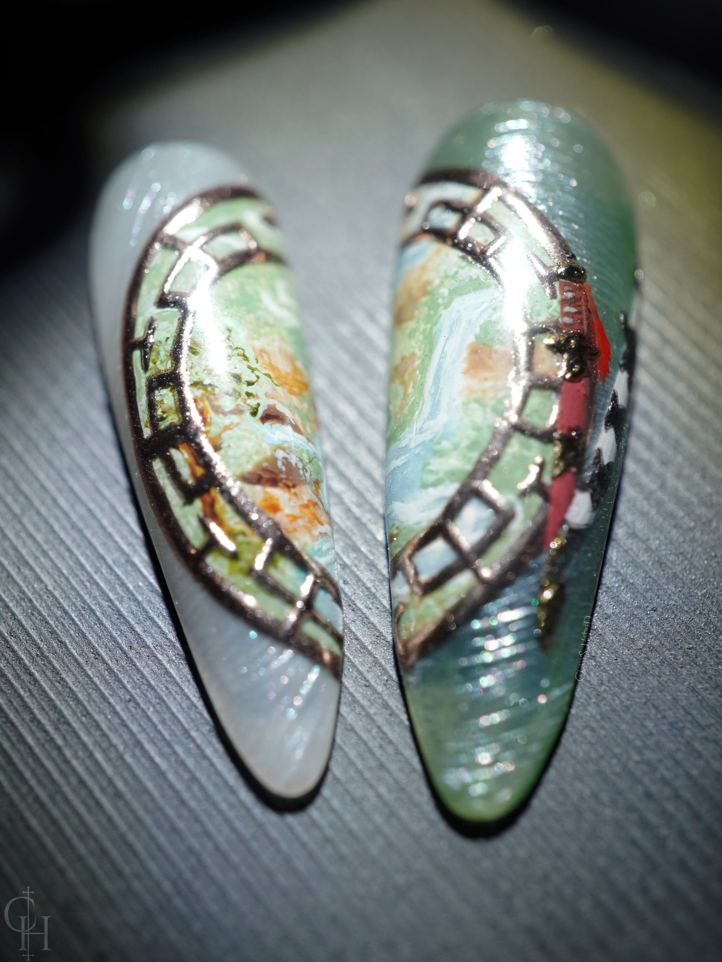 lunar new year love and deepspace set inspired by the key art for the event. pearl textured bases with semi-transparent jelly shades ranging from blue to pink to green and milky white. handpainted landscapes seen through chinese architectural-inspired frames, and apple blossoms on the thumbs. 