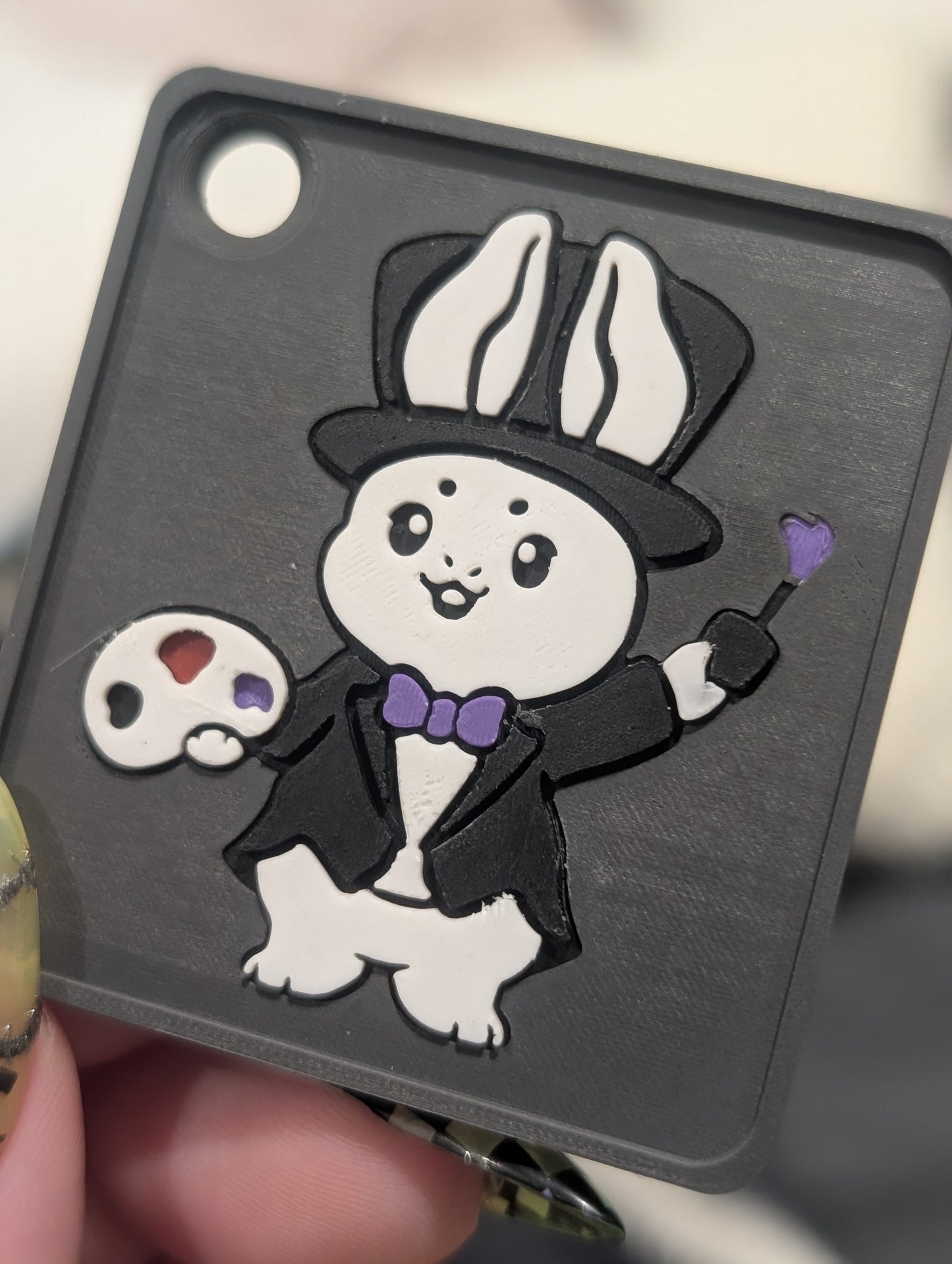 a custom nfc keychain with the bunny logo for golden creations