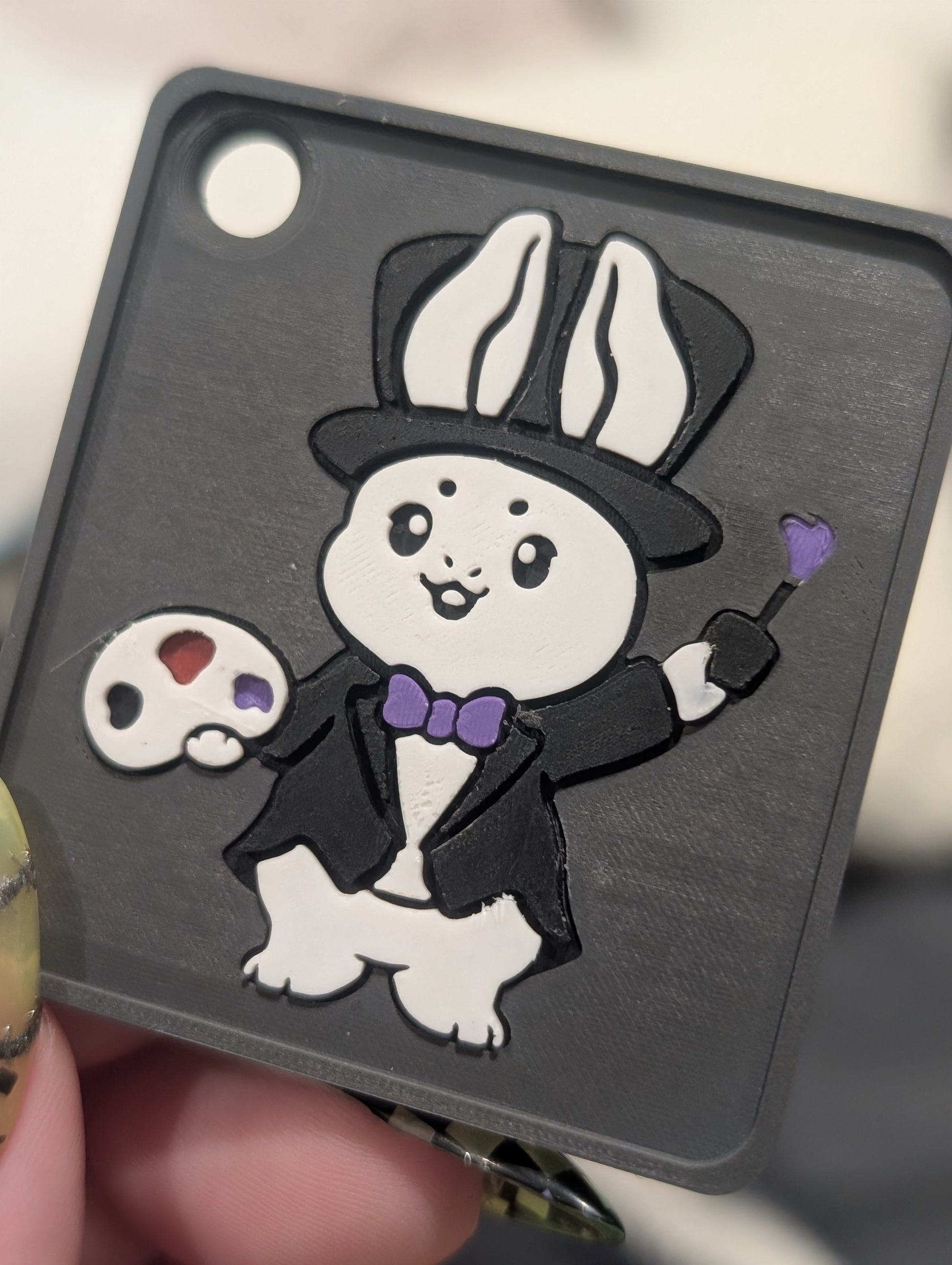 a custom nfc keychain with the bunny logo for golden creations