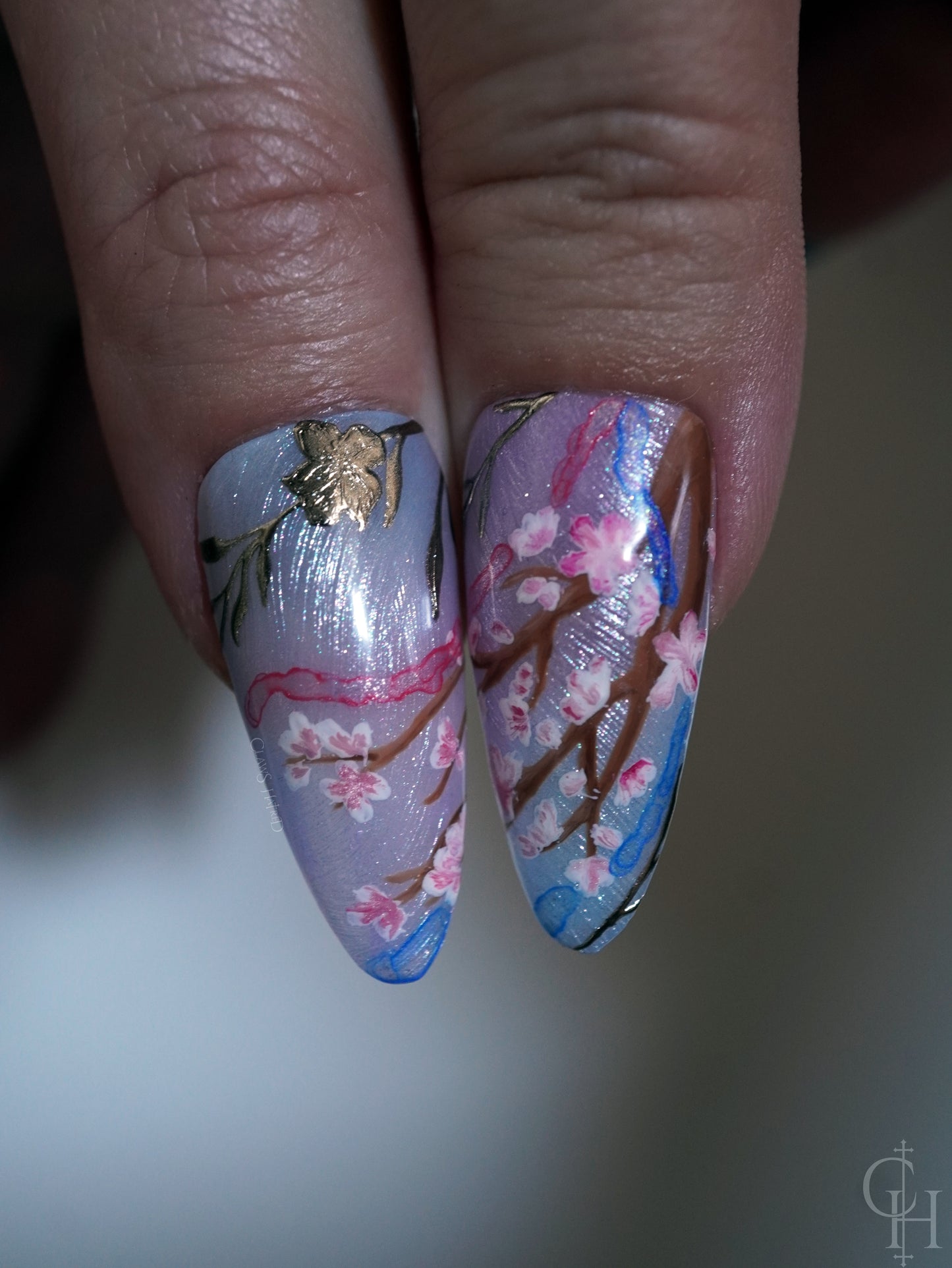 lunar new year love and deepspace set inspired by the key art for the event. pearl textured bases with semi-transparent jelly shades ranging from blue to pink to green and milky white. handpainted landscapes seen through chinese architectural-inspired frames, and apple blossoms on the thumbs. 