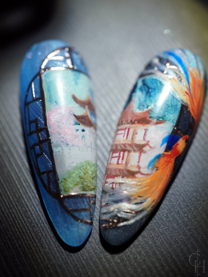 lunar new year love and deepspace set inspired by the key art for the event. pearl textured bases with semi-transparent jelly shades ranging from blue to pink to green and milky white. handpainted landscapes seen through chinese architectural-inspired frames, and apple blossoms on the thumbs. 