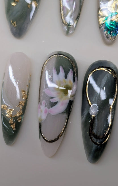 imperial dragon design in jade variant. marbled green and white veins, hand painted dragon elements, 3d lotus flowers, and gold chrome paired with pearls complete this timeless look