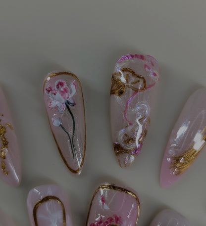 imperial dragon design in rose quartz variant. marbled pink and white veins, hand painted dragon elements, 3d lotus flowers, and gold chrome paired with pearls complete this timeless look