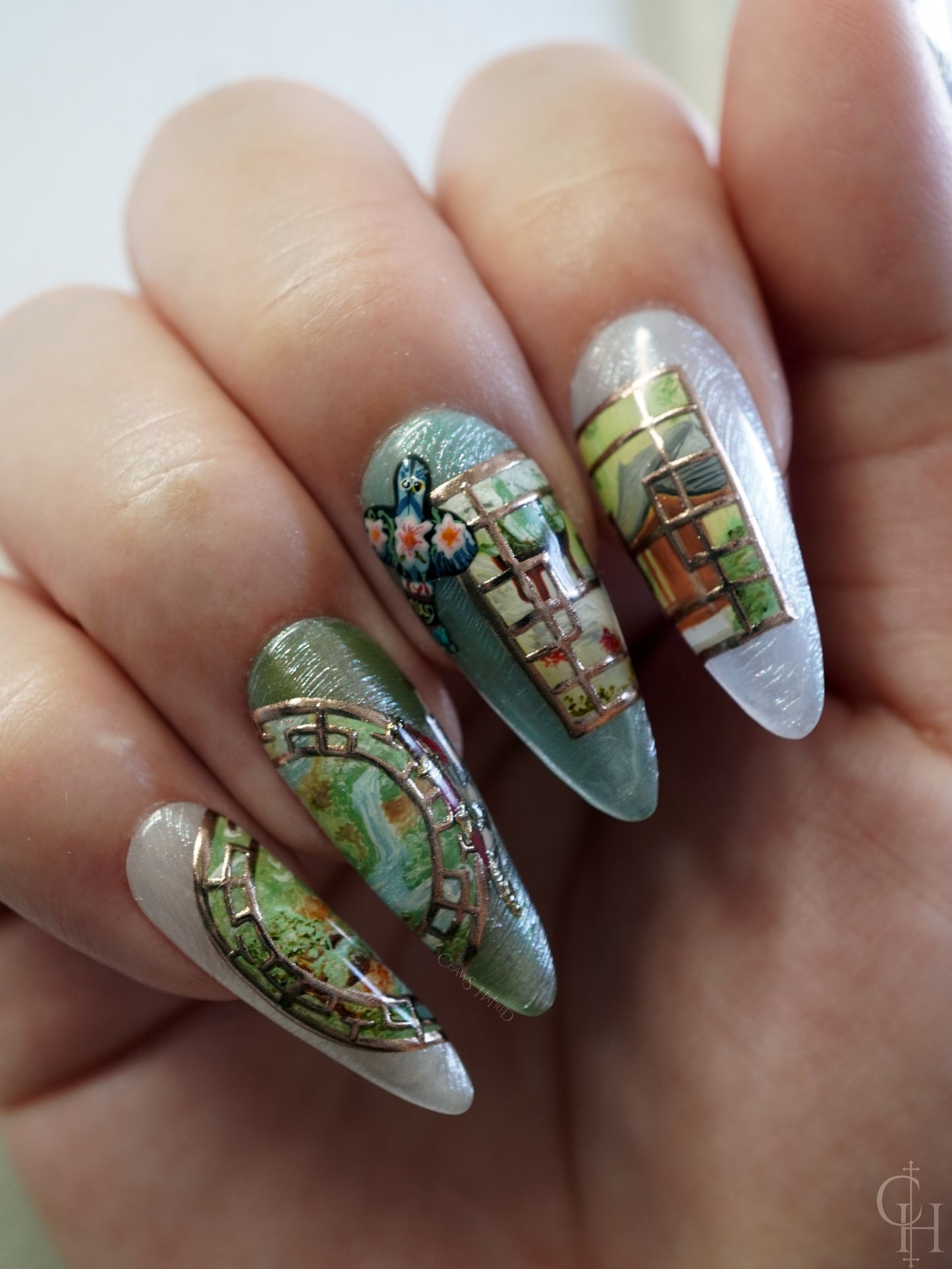 lunar new year love and deepspace set inspired by the key art for the event. pearl textured bases with semi-transparent jelly shades ranging from blue to pink to green and milky white. handpainted landscapes seen through chinese architectural-inspired frames, and apple blossoms on the thumbs. 