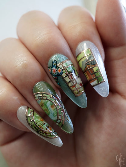 lunar new year love and deepspace set inspired by the key art for the event. pearl textured bases with semi-transparent jelly shades ranging from blue to pink to green and milky white. handpainted landscapes seen through chinese architectural-inspired frames, and apple blossoms on the thumbs. 